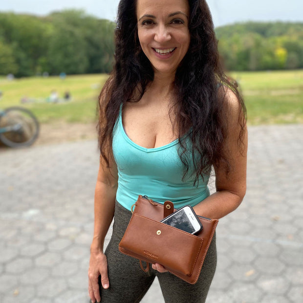 smell-proof wristlet pursemade of genuine leather with activated carbon smell-proof pocket