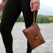 smell-proof wristlet pursemade of genuine leather with activated carbon smell-proof pocket
